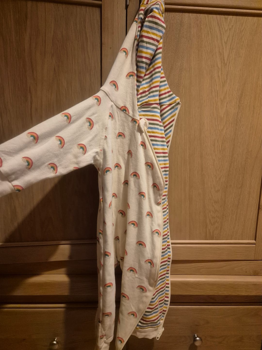 Customer photo review of Cream Rainbows Reversible Hooded Snug As A Bug Suit