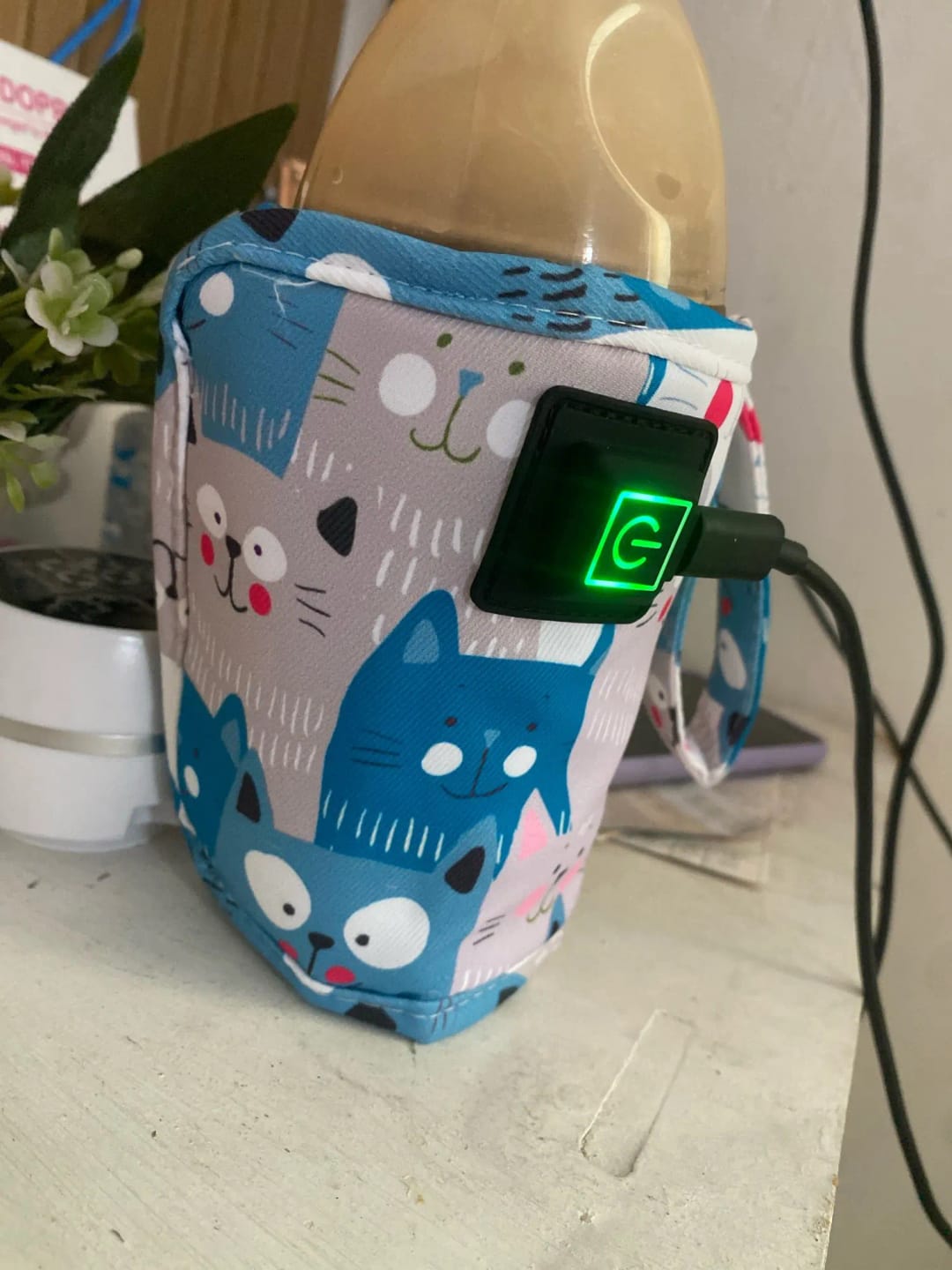 Customer photo review of Calentador de Biberones Portátil USB