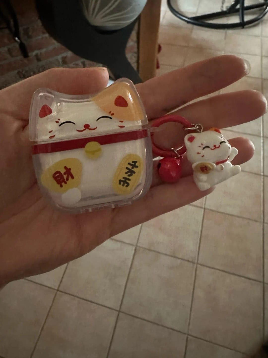 Customer photo review of Kawaii Lucky Cat AirPods Case