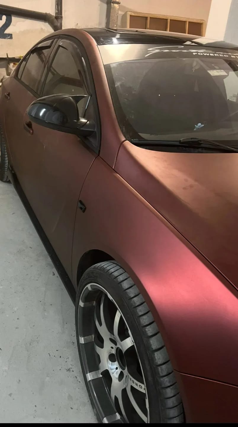 Customer photo review of Mallcas™ Ultra Matte Wine Red Vinyl Wrap (PET Liner)