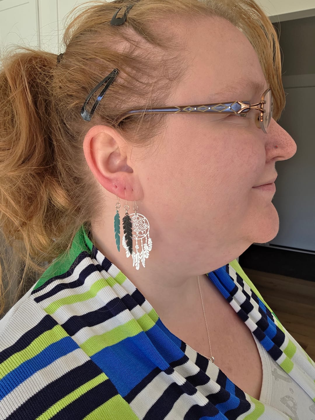 Customer photo review of Dainty Feather Dangles
