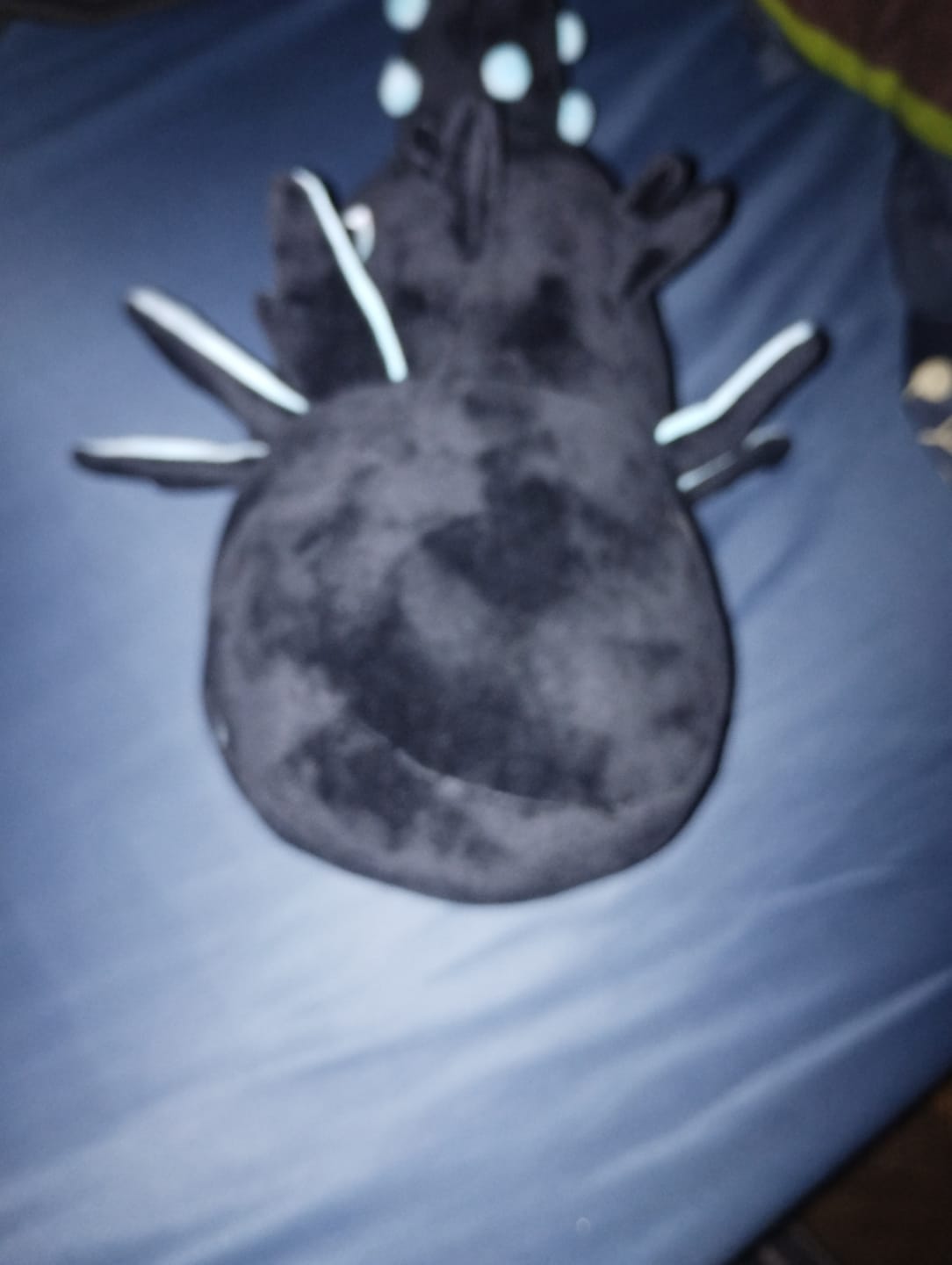 Customer photo review of Rain World - Glowing Cyan Lizard Plush