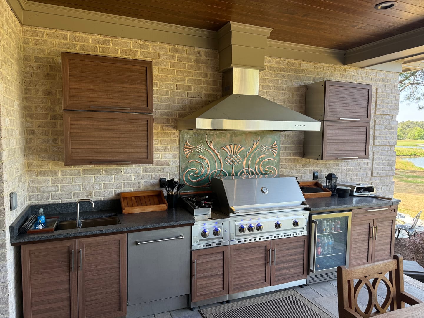 Customer photo review of Scottish Heritage Kitchen Backsplash Tile - Copper Thistle Emblem - Green Patina