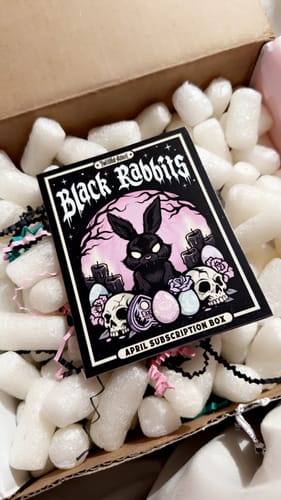 Close-up on the 'Black Rabbits' April card inside the customer's Monthly Subscription Box.
