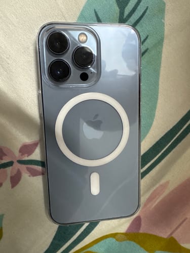 Customer's blue iPhone 13 Pro in the Anti Yellow Magsafe Clear Case, showing the fit and MagSafe ring.