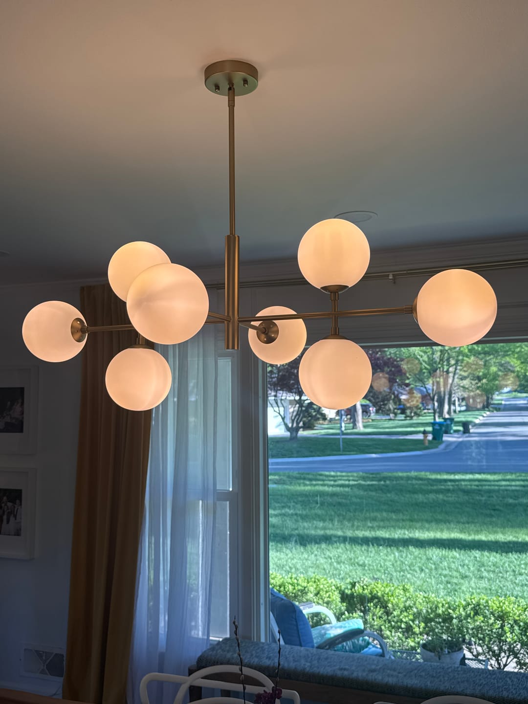 Customer photo review of 8-Light Linear Sputnik Frosted Glass Globe Chandelier