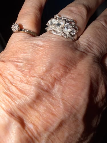 Customer photo review of Five Stone Round Moissanite Multi-Row Crossover Pave Engagement Ring