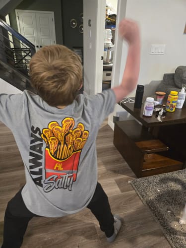 Customer photo review of Youth Always Salty Tee