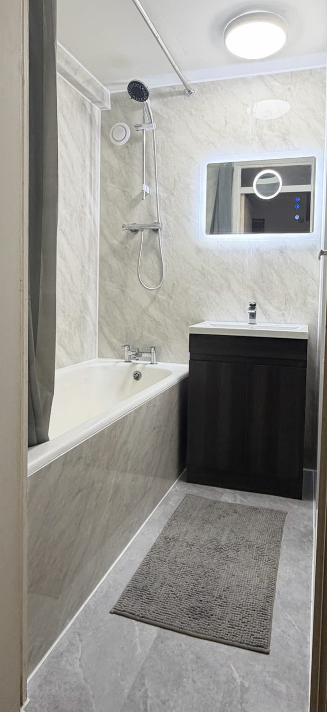 Customer photo review of 8mm White Wood Matt Bathroom Wall & Ceiling Panel 2.6M