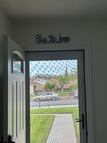 Customer photo review of Christianartworkshop Bless This Home Metal Wall Decor: Divine Blessing & Faithful Warmth