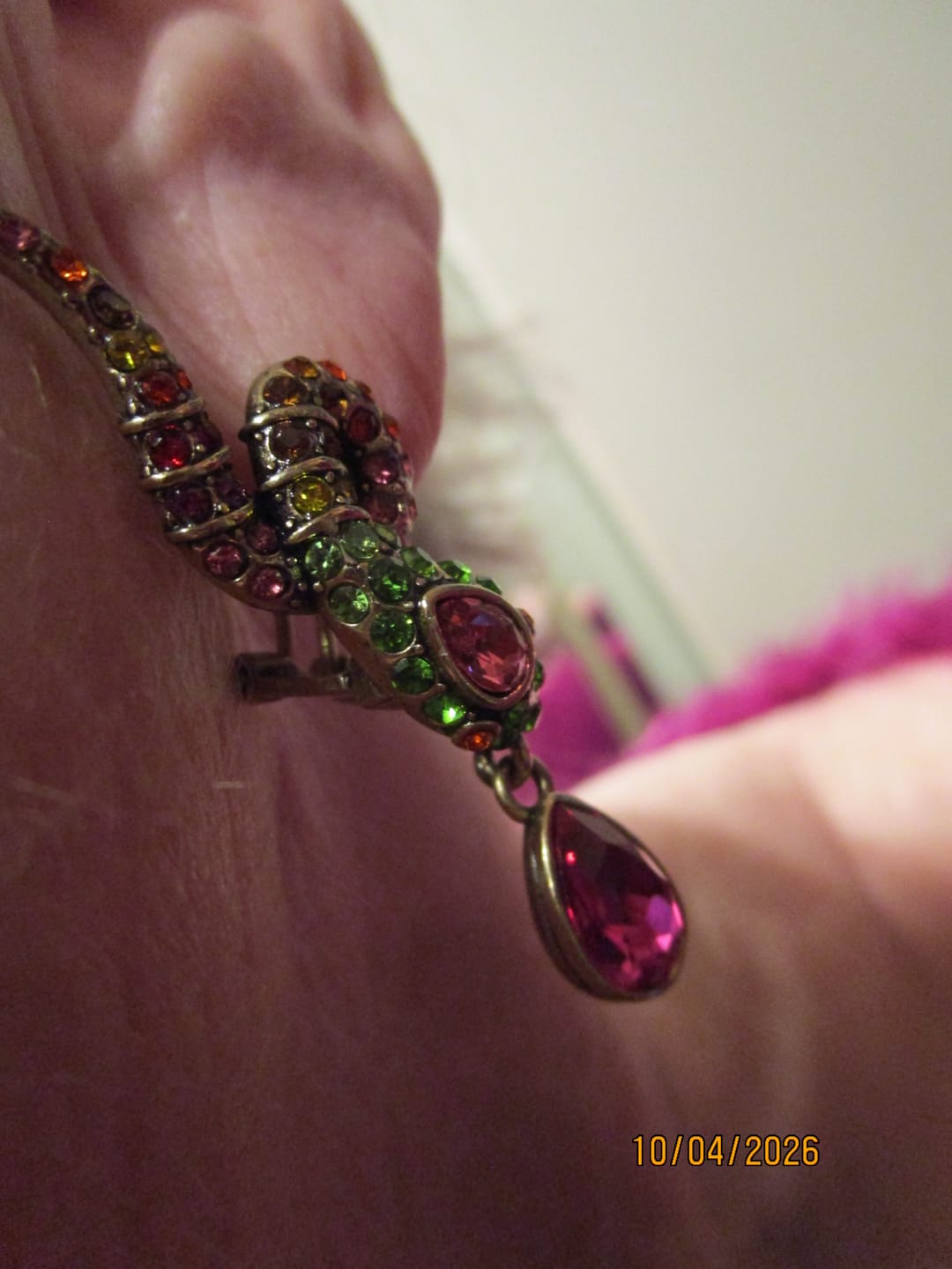 Customer photo review of HEIDI DAUS®"Gorgeous Glimmer Snake" Crystal Snake Dangle Earrings