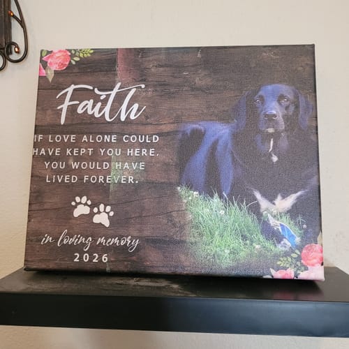 Customer's custom dog memorial canvas with a photo of a black dog, the name 'Faith', and a quote on a wood-style background.