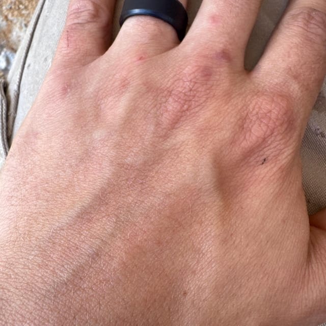 Customer photo review of Men's Tactical Silicone Rings, 9mm Wide 2.5mm Thick, Silicone wedding ring black & gunmetal color