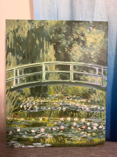 Reviewer's completed canvas from the Water Lilies and Japanese Bridge paint by numbers kit, showing the final painting.