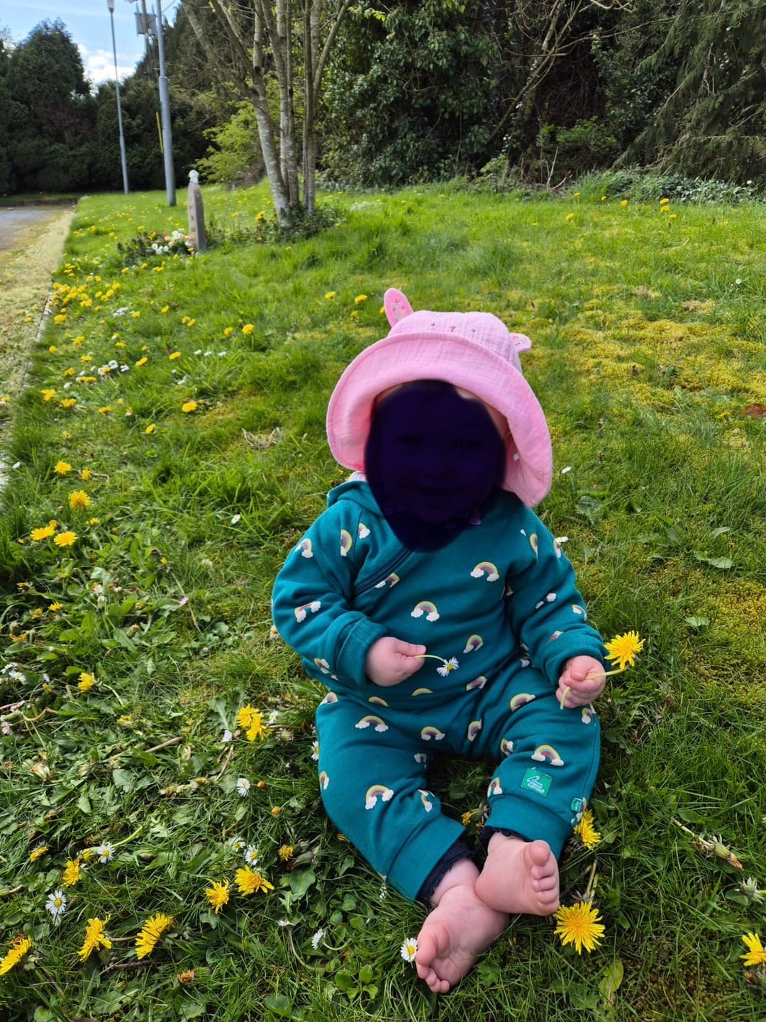 Customer photo review of Turquoise Rainbows Hooded Reversible Snug Suit