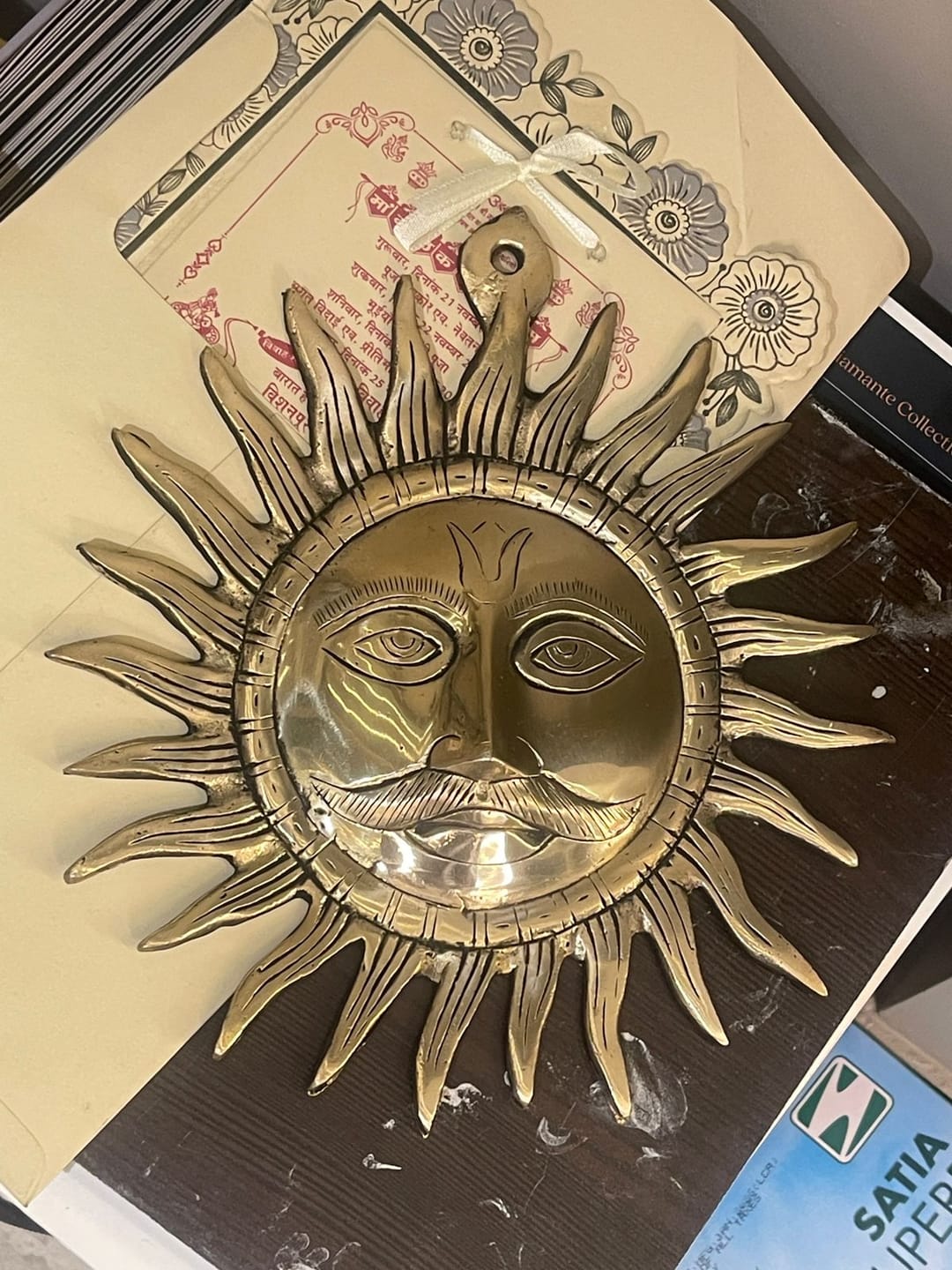 Customer photo review of Brass Surya (Sun) Ji Wall Hanging Idol Vastu Remedy for East Direction Balance, Fame and Positive Energy | 24 X 24 cm | 1 kg