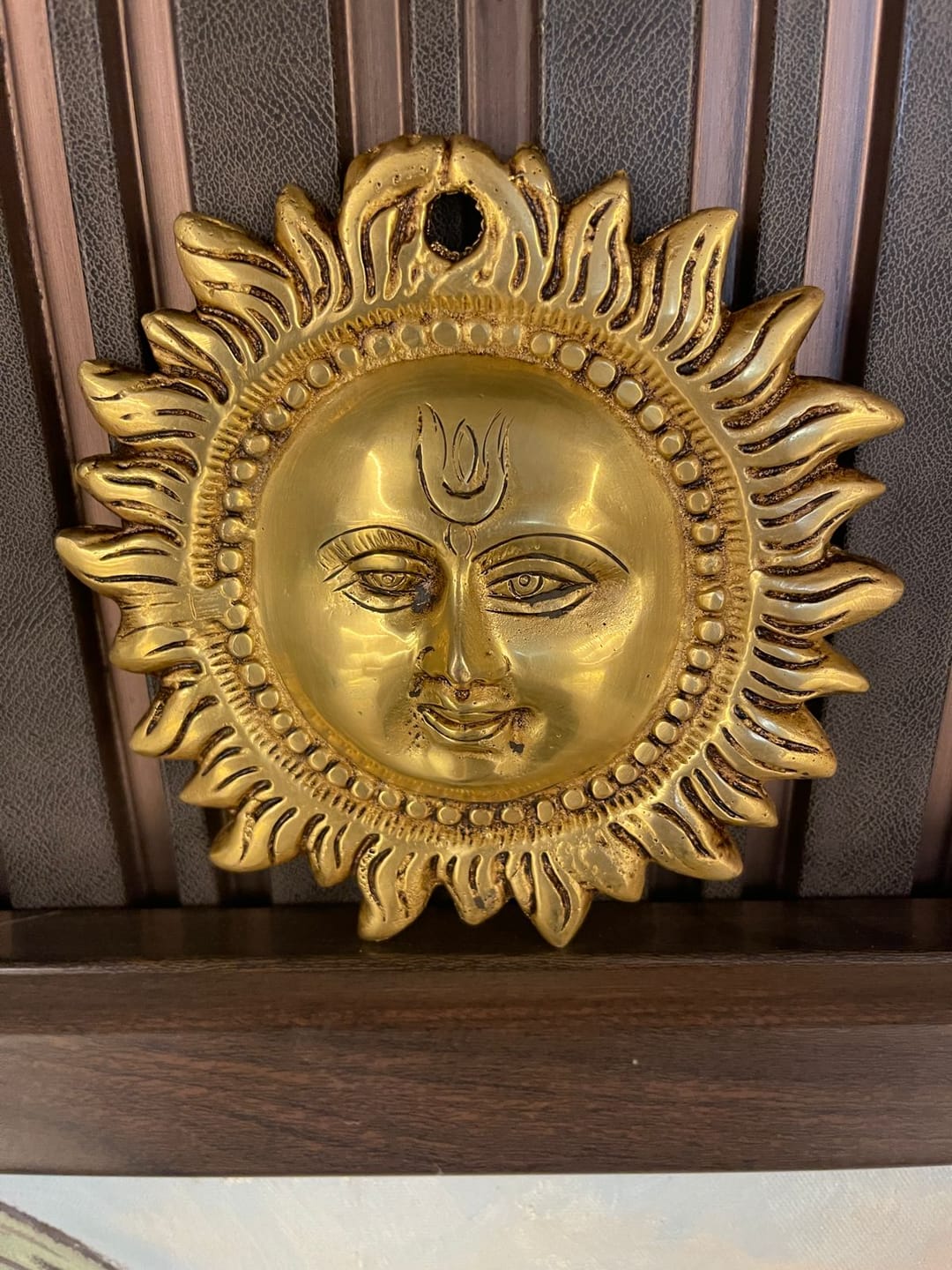 Customer photo review of Brass Vastu Sun Wall Hanging Idol Vastu Remedy for East Direction Balance, Fame and Positive Energy for Home, Office and Entrance Decor | 15 x 15 cm | 800 g
