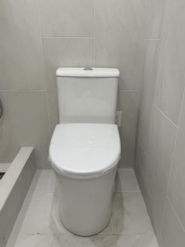 Customer photo review of Lyngen - Soft Closing Seat Concealed Tank Elongated Bowl Floor Mounted Installation Ceramic One-Piece Dual Flush Toilet