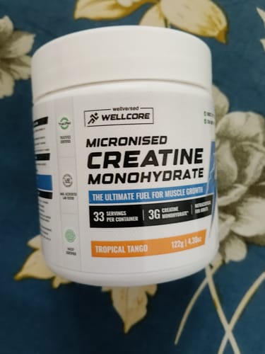Customer's white tub of Wellcore Micronised Creatine Monohydrate in the Tropical Tango flavor.