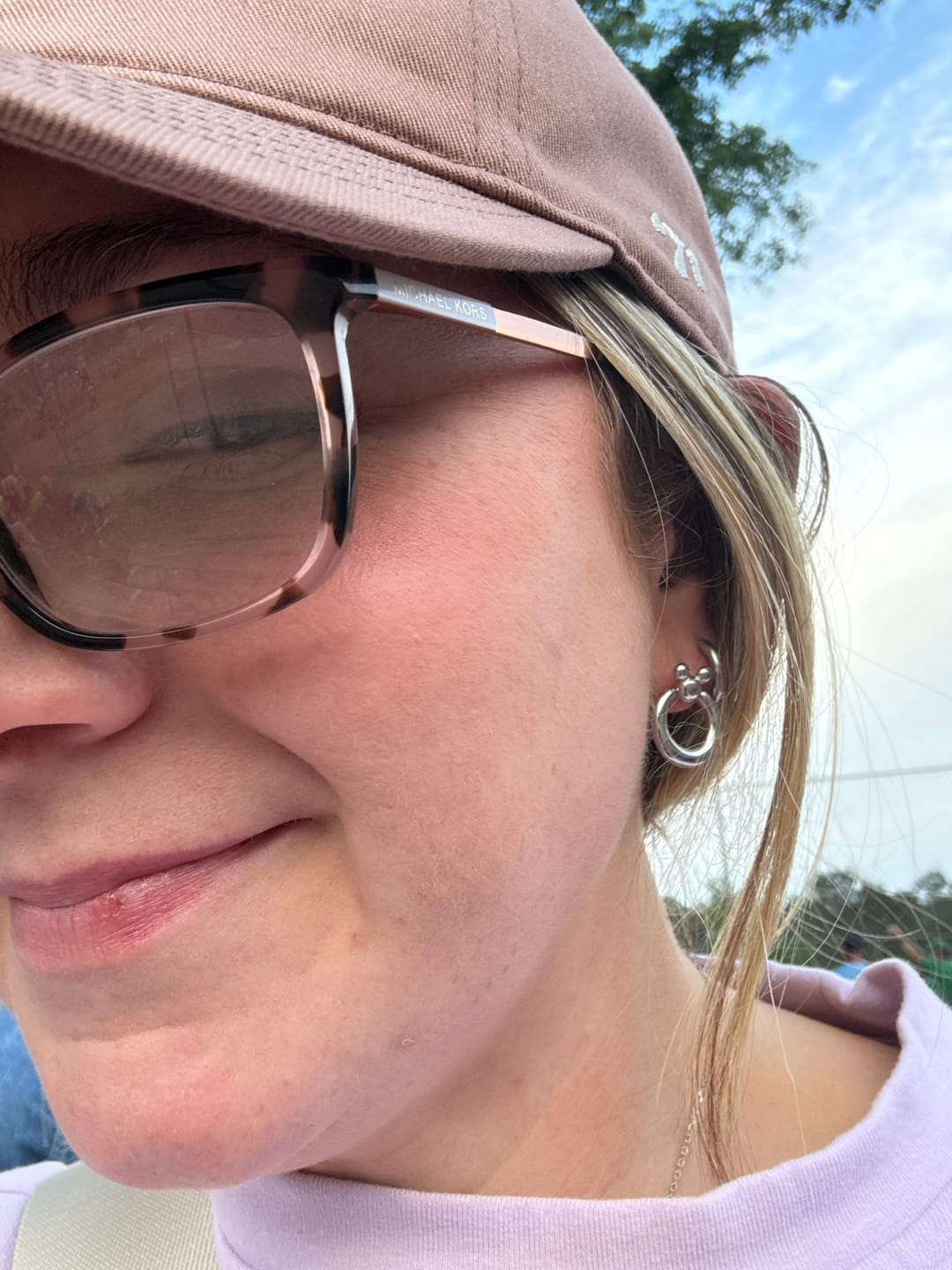 Customer photo review of Mini Leader of the Club Earrings