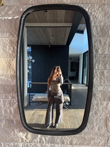 Reviewer's mirror selfie showing a full outfit with the black Block Heel Ankle Boots.