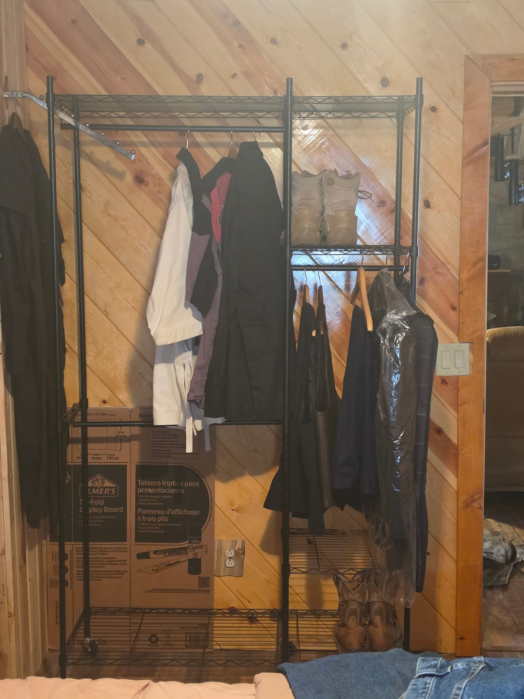 Customer photo review of Raybee Heavy Duty Portable Clothes Rack With Wheels,Clothing Rack For Hanging,Garment Rack For Bedroom