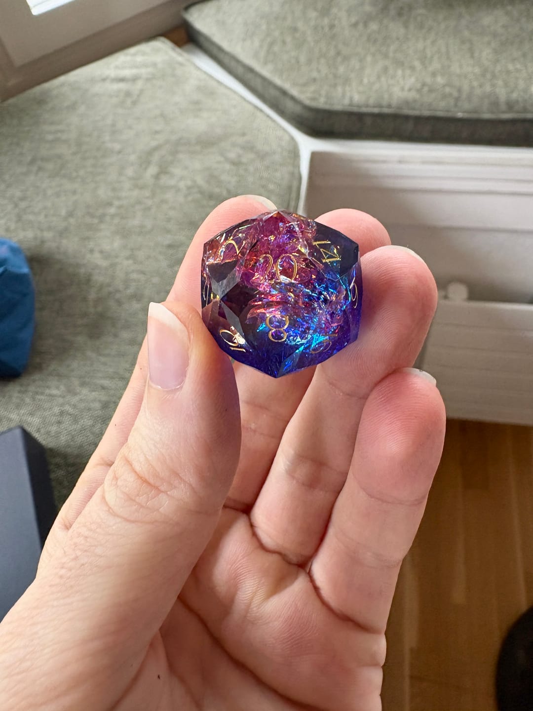 Customer photo review of URWizards D&D Resin Cosmic Burn Engraved Dice Set Multi-faceted Style