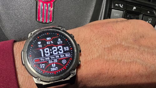 Close-up of a customer's watch with the ULTRA 3 Screen Protector. Small scratches are visible on the protector's surface.