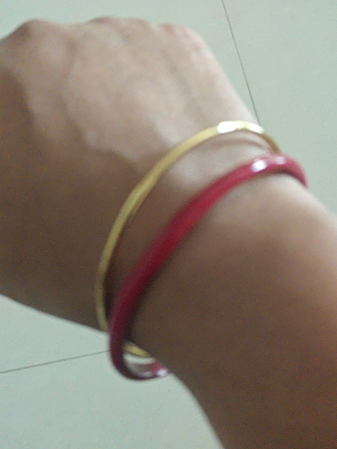 Customer photo review of Slim Golden Bangle