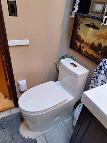Customer photo review of Are - One-Piece 1.1/1.6 GPF Dual Flush Round Toilet in White Soft Close Seat Included