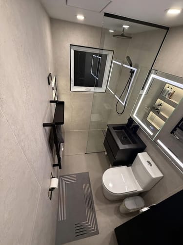 Customer photo review of Are - One-Piece 1.1/1.6 GPF Dual Flush Round Toilet in White Soft Close Seat Included