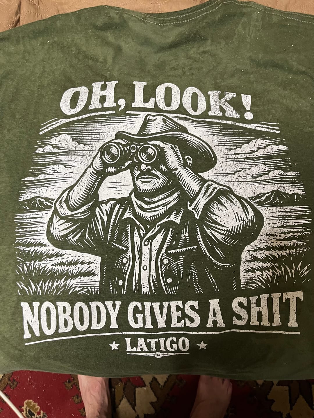 Customer photo review of Survived Tee