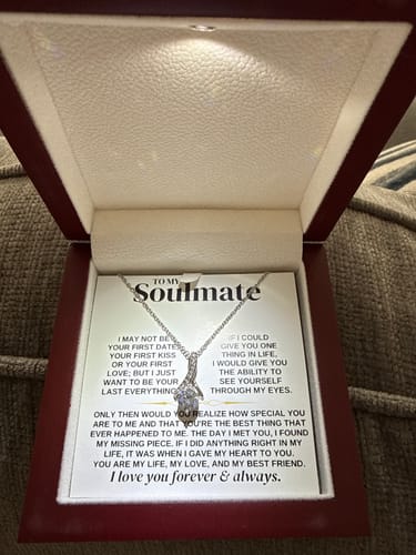 Reviewer's 'To My Soulmate' gift set in an open mahogany box, with the built-in light shining on the necklace and message card.
