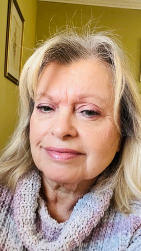 A close-up of a reviewer's face after using the Koriderm™ Time Reverse Cream.