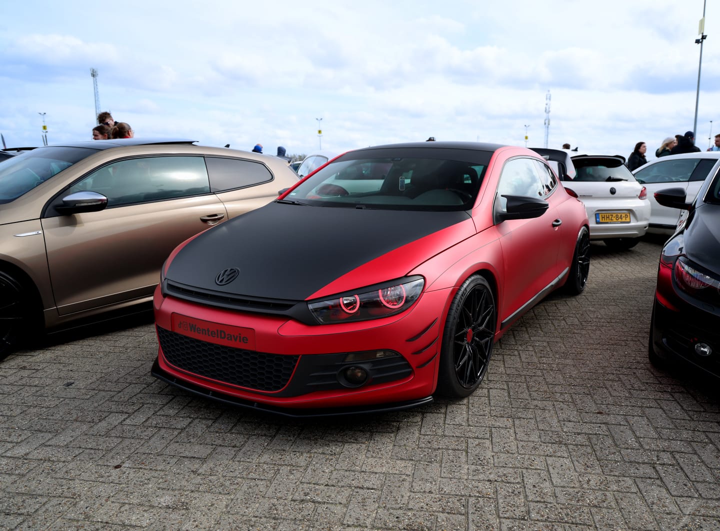 Customer photo review of Satin Chrome Prismatic Red Vinyl Wrap