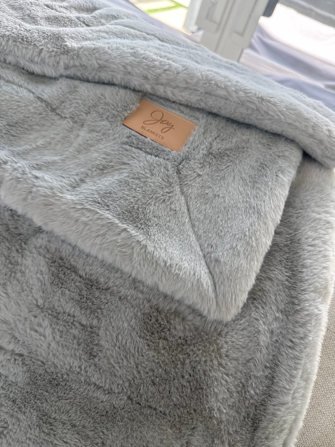 Customer photo review of The Joy Luxury Blanket