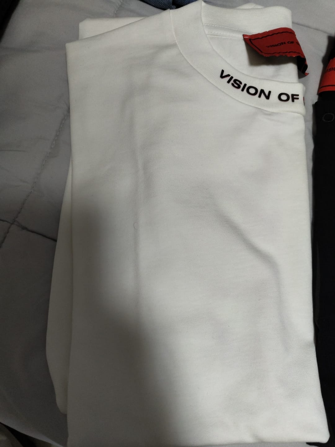 Customer photo review of T-shirt VISION OF SUPER bianca con fiamma rossa