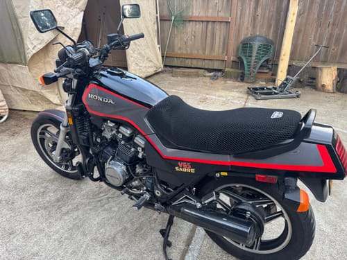 Customer's black Wind Rider Seat Cover installed on a Honda Sabre motorcycle.