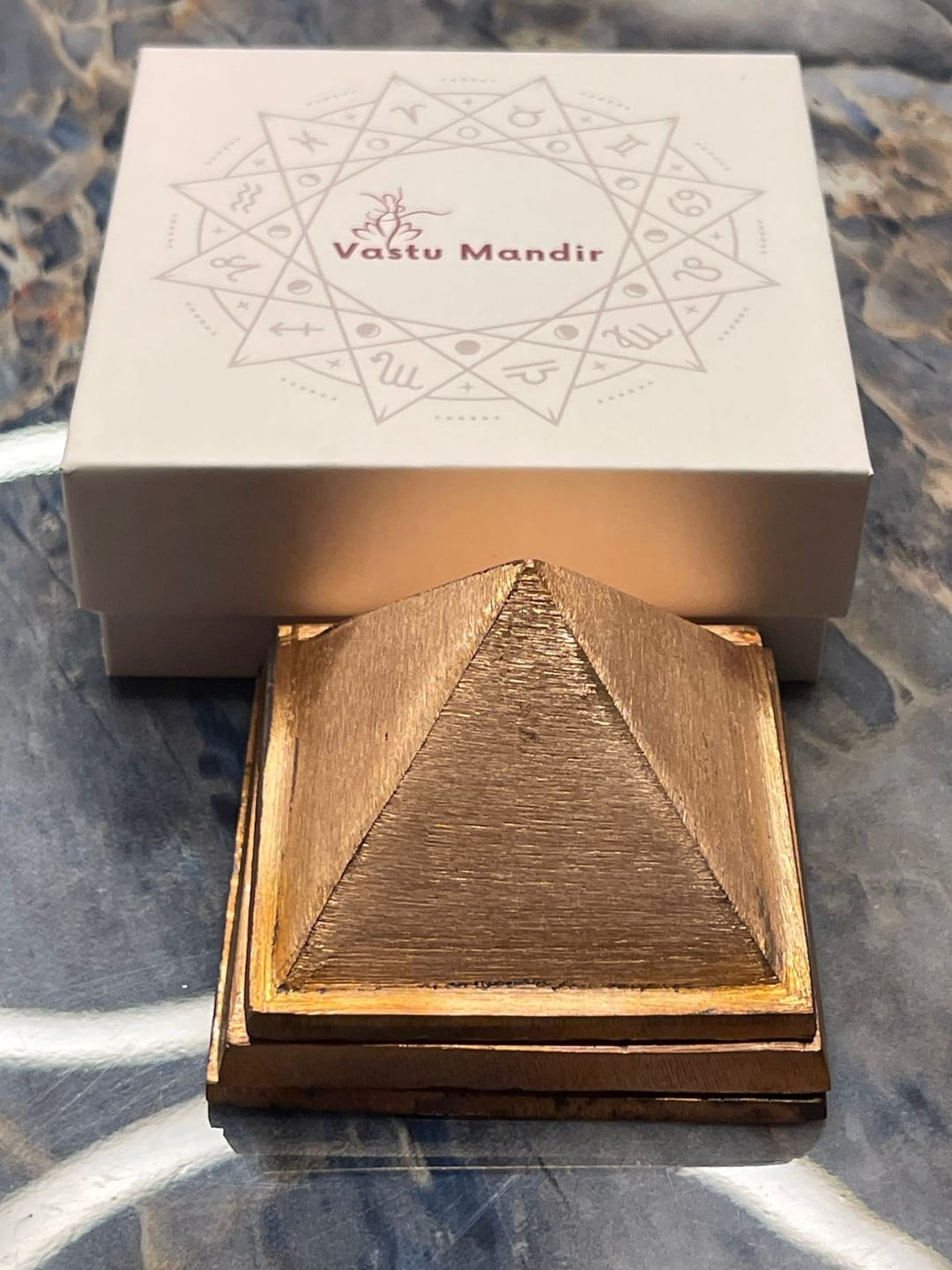 Customer photo review of 3-Layer Copper Pyramid Vastu Remedy for Energy Amplification, Prosperity and South East Direction Activation for Home, Office and Vastu Correction | 5-7.6 cm | 665 g