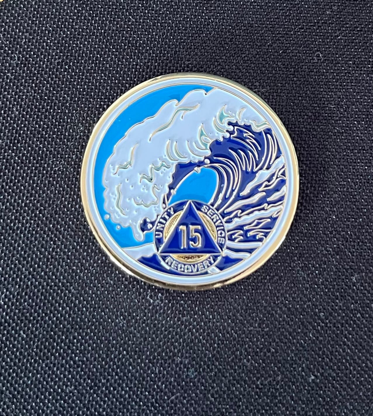 Customer photo review of 15 Year Sobriety Mint Crashing Wave Gold Plated AA Recovery Medallion - Fifteen Year Chip/Coin - Blue/White