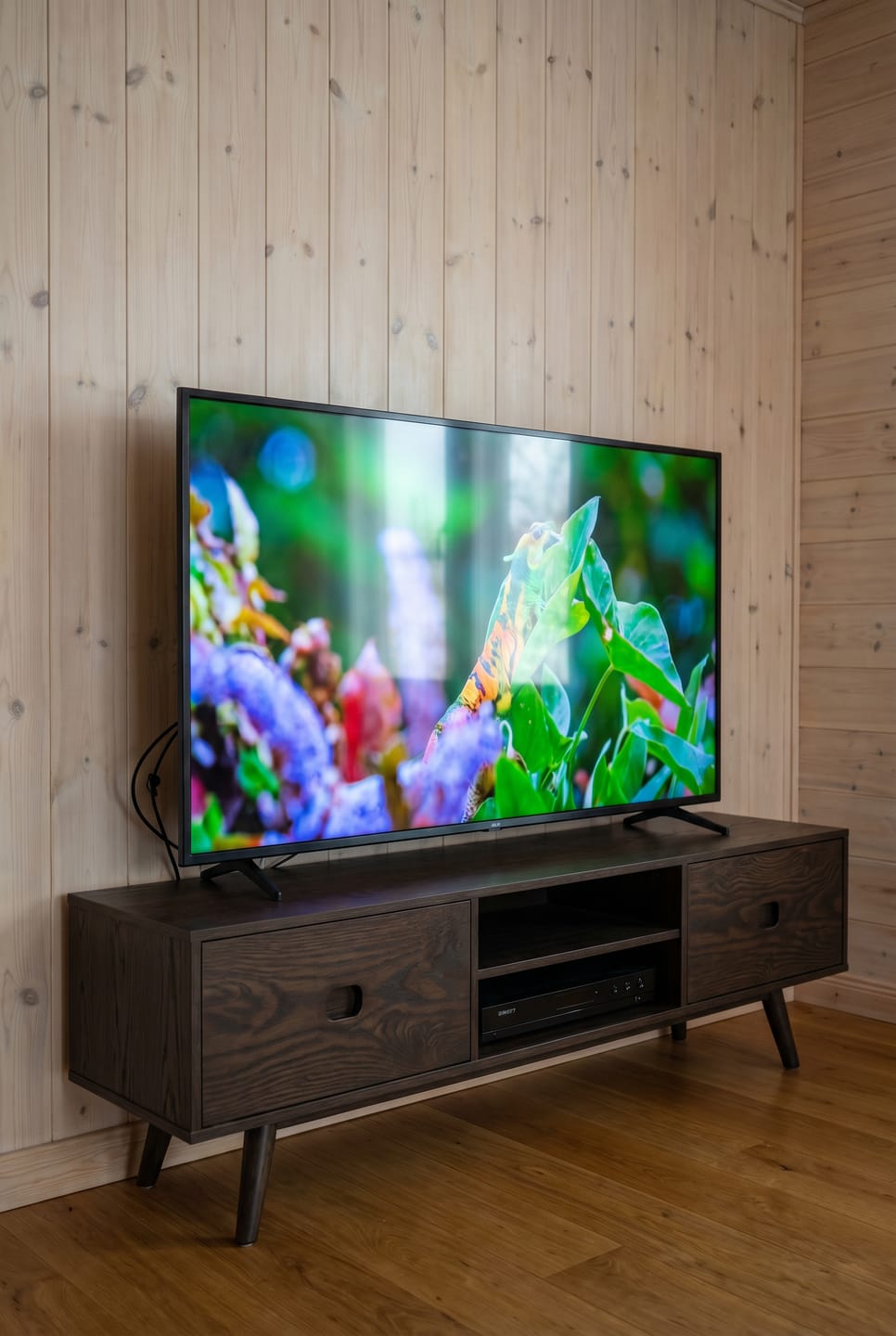 Customer photo review of Natural Wood TV Console with Sliding Door Storage and Center Shelf