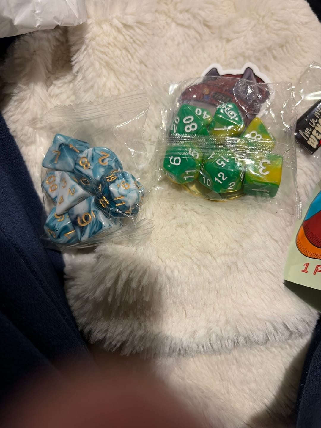 Customer photo review of Premium Mystery Dice Set – 100's of different dice, stickers and pins! Handpacked in Portland, OR.