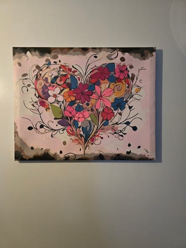 Customer's completed Abstract Heart paint by numbers painting, a colorful floral design, hung on a wall.
