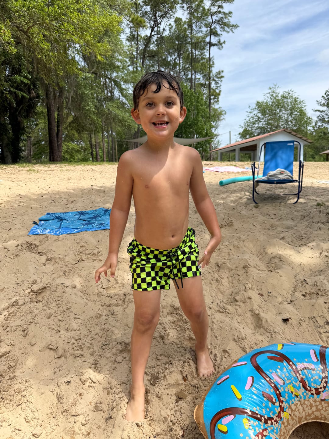 Customer photo review of Hybrid Swim Trunks in Neon Electric Lime + Black Checkered