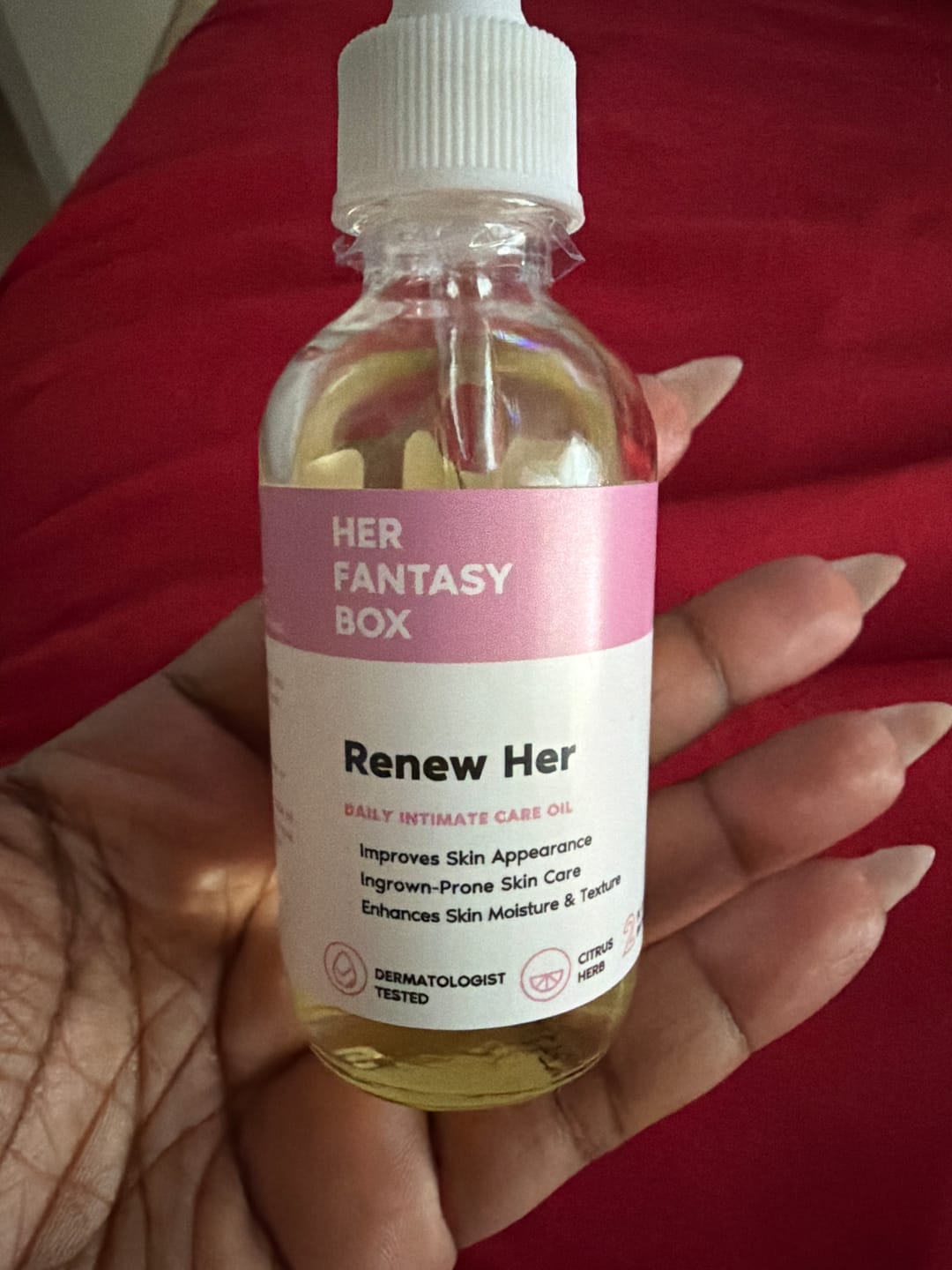 Customer photo review of Her Fantasy Box Renew Her Yoni Oil - For Dryness, Ingrown Hair, Dark Marks & Scars