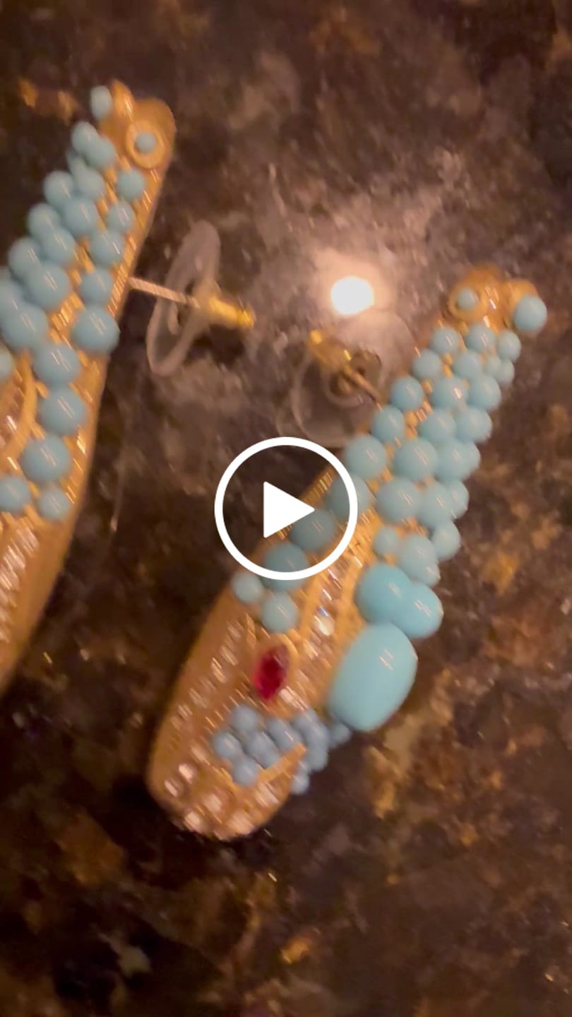 Customer video review of Nile Serpent Turquoise Earrings