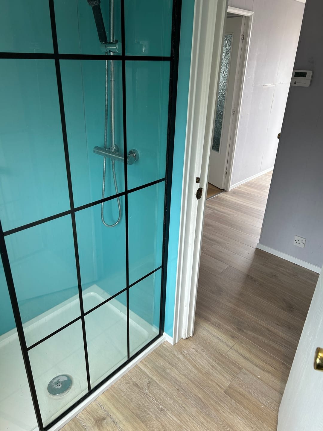 Customer photo review of 10mm Aqua Blue Shimmer Gloss Shower Panel 1M x 2.4M