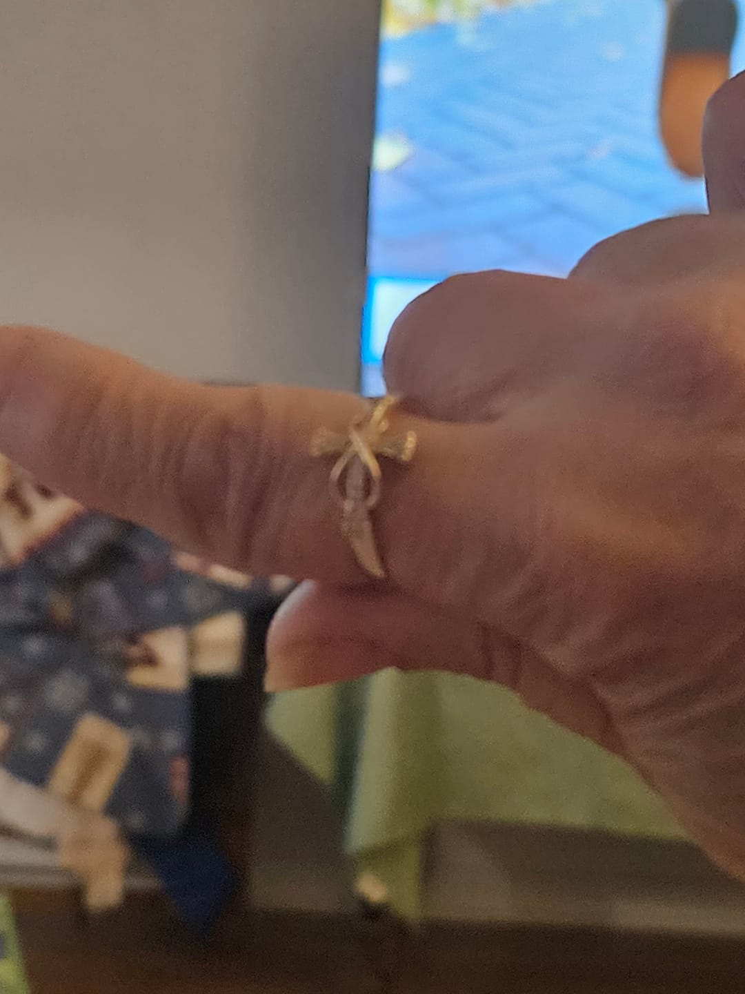 Customer photo review of Christianartworkshop Golden/Silver Mobius Cross Ring: Carry His Grace in Daily Wear