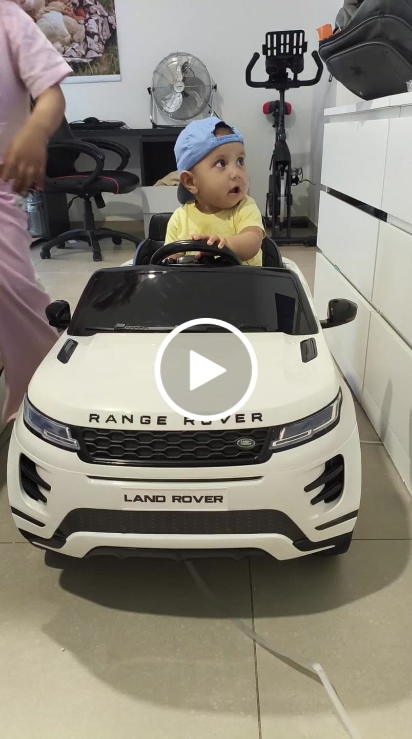 Customer video review of Carro Elétrico para Criança RANGE ROVER EVOQUE 12v Branco c/ RODAS DE BORRACHA & ASSENTO EM PELE