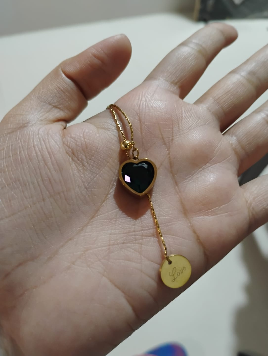 Customer photo review of Emerald Love Necklace